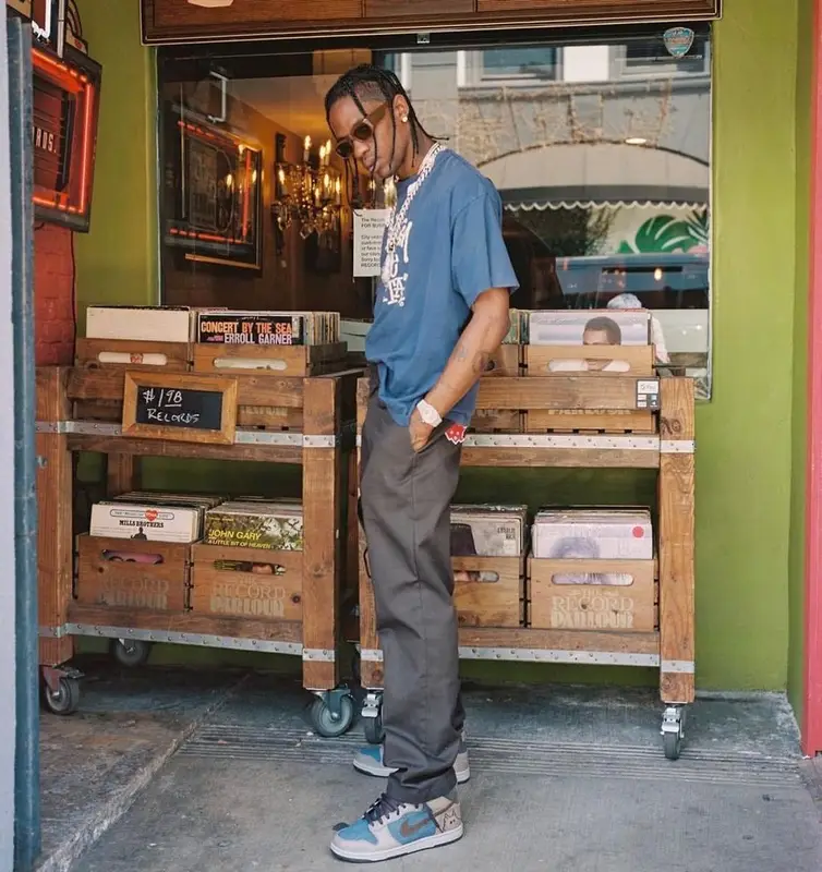 Travis Scott outfit in Stussy, Nike, and Port Tanger, 2021