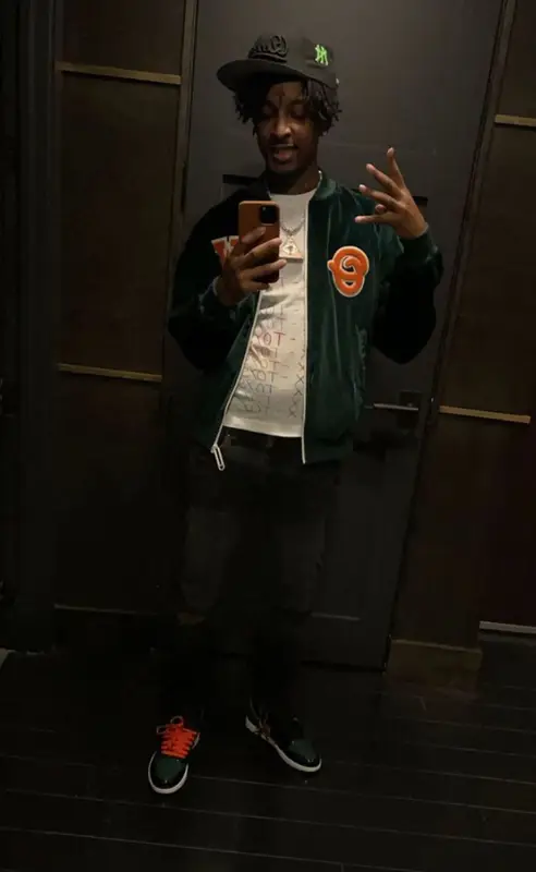 21 Savage outfit in Off-White, Amiri, and Nike, 2021