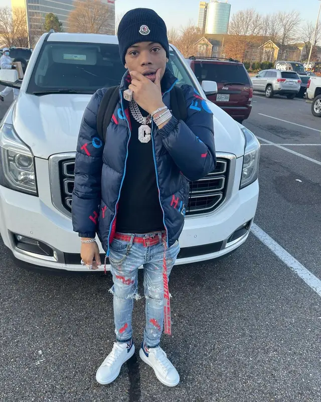 Lil Migo outfit in Tommy Hilfiger, Off-White, and Moncler, 2021