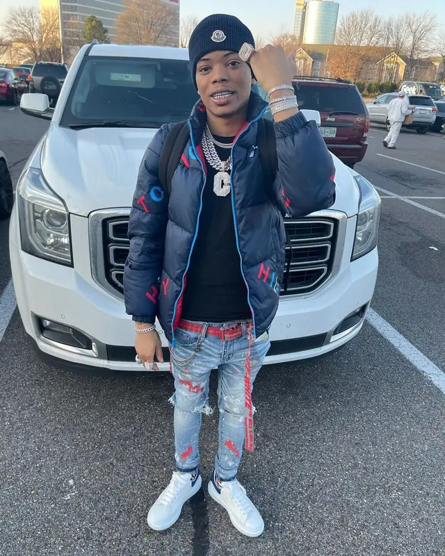 Lil Migo outfit in Tommy Hilfiger, Off-White, and Moncler, 2021