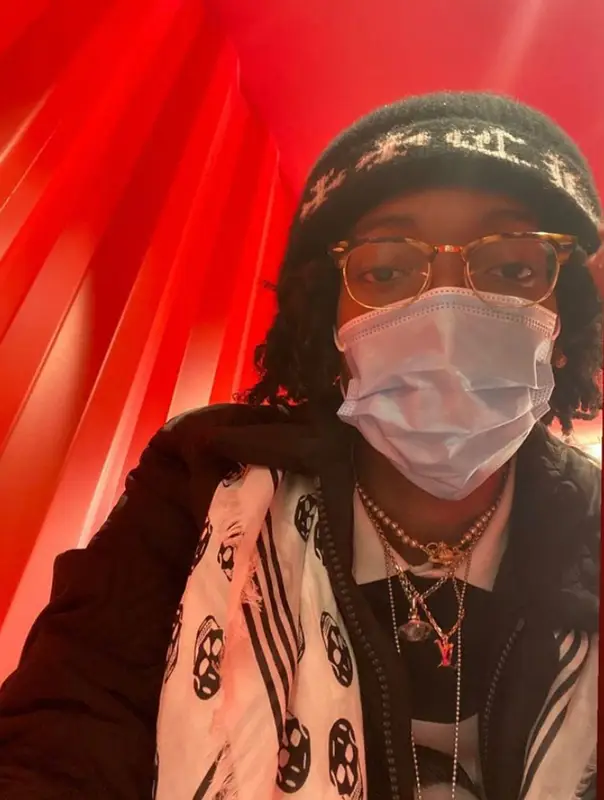 Lil Tecca outfit in Louis Vuitton, Ray-Ban, and Alexander McQueen, 2021