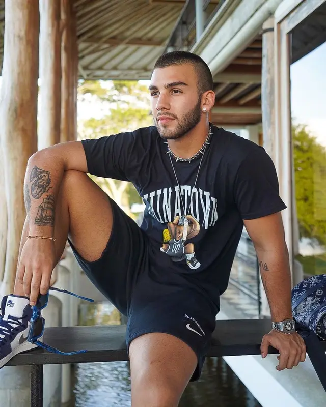 Manuel Turizo outfit in Market, Supreme, and Louis Vuitton, 2021