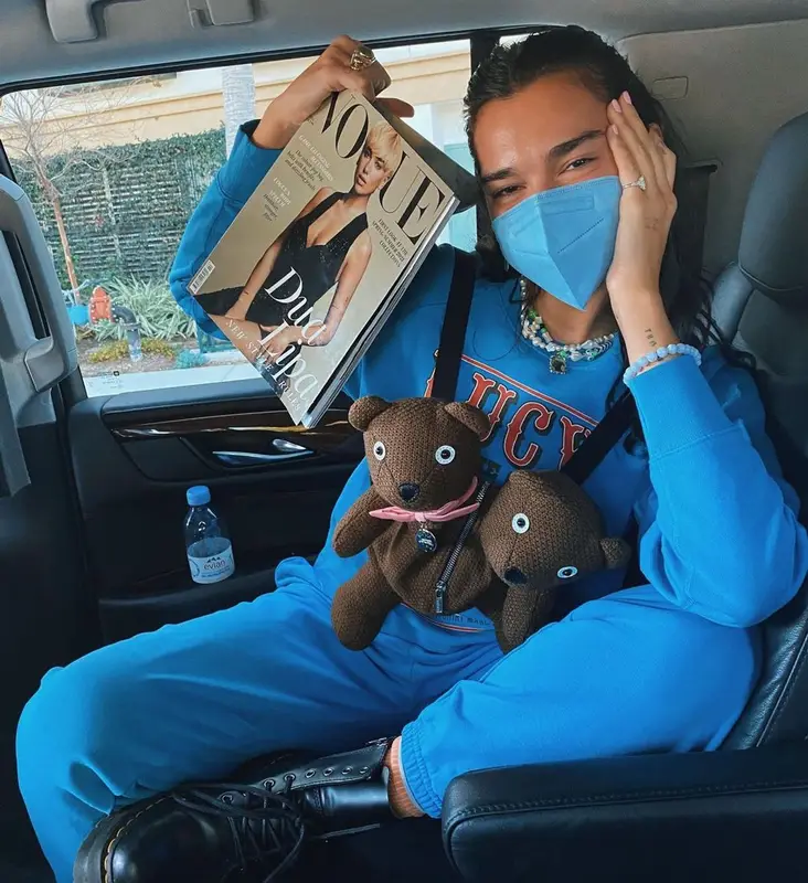 Dua Lipa outfit in Marc Jacobs, Dr. Martens, and Shay Jewelry, 2021