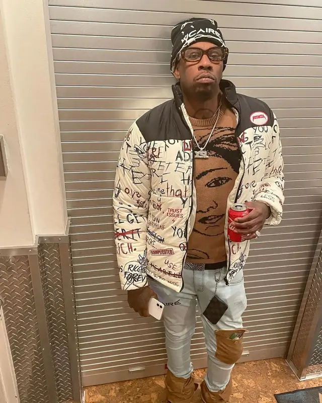 Lil Duke outfit in Ricchezza Forever, Vicaire, and Louis Vuitton, 2021