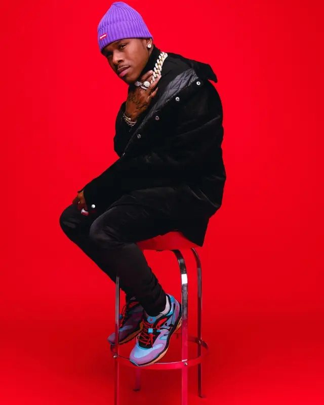 DaBaby outfit in Amiri, Louis Vuitton, and Supreme, 2021