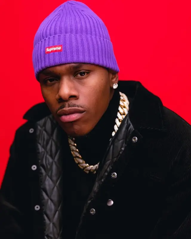 DaBaby outfit in Amiri, Louis Vuitton, and Supreme, 2021