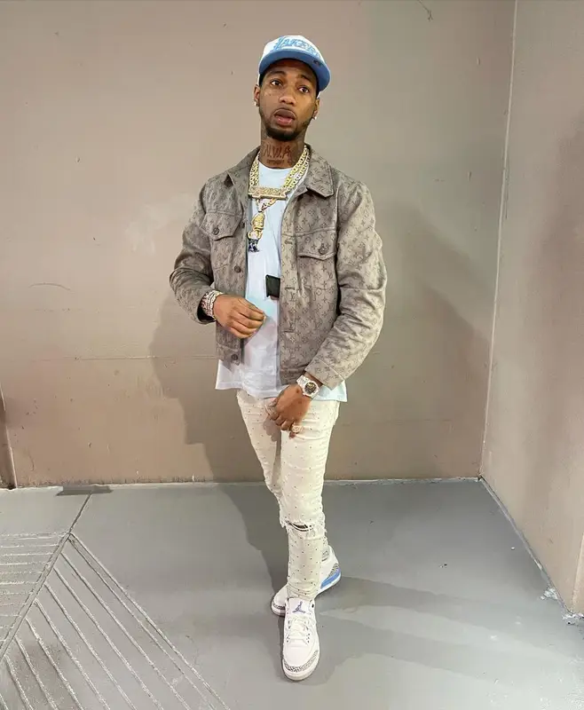 Key Glock outfit in Louis Vuitton, Amiri, and New Era, 2021
