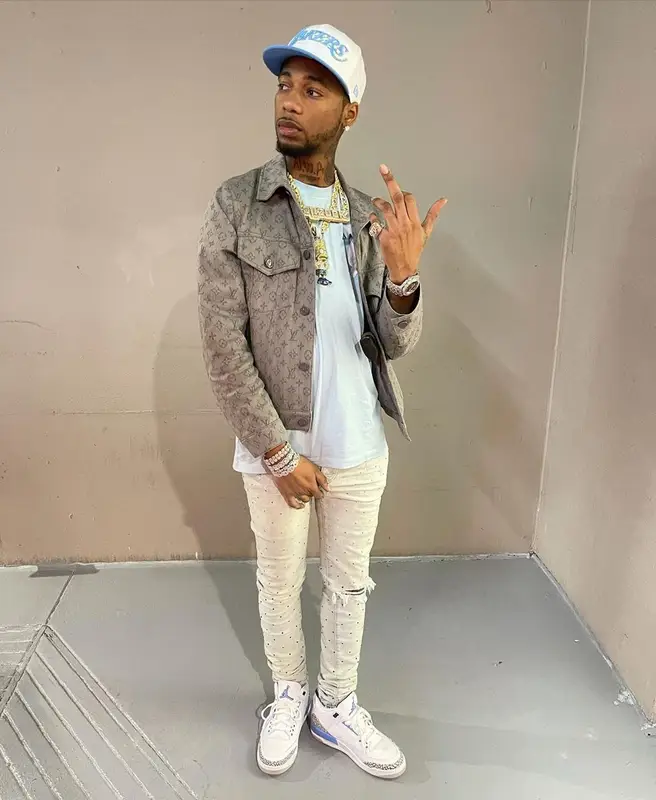 Key Glock outfit in Louis Vuitton, Amiri, and New Era, 2021