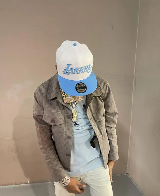 Key Glock outfit in Louis Vuitton, Amiri, and New Era, 2021