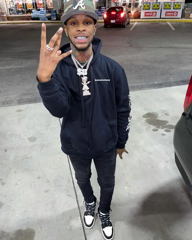 Toosii outfit in Amiri, Nike, and New Era, 2021