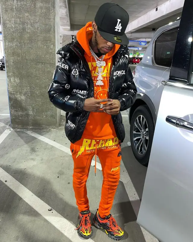 Toosii outfit in Moncler, New Era, and Fragment, 2021
