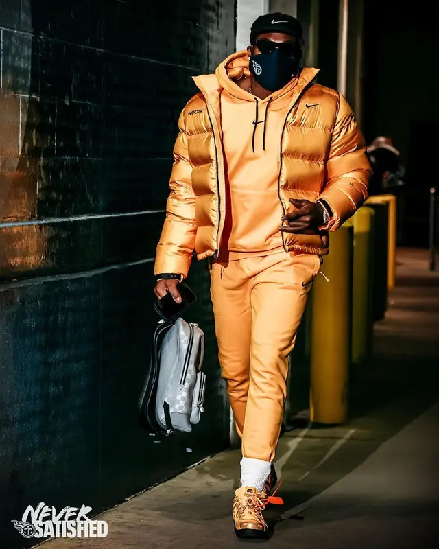 Derrick Henry outfit in Nike, Louis Vuitton, and Drake Merch, 2021