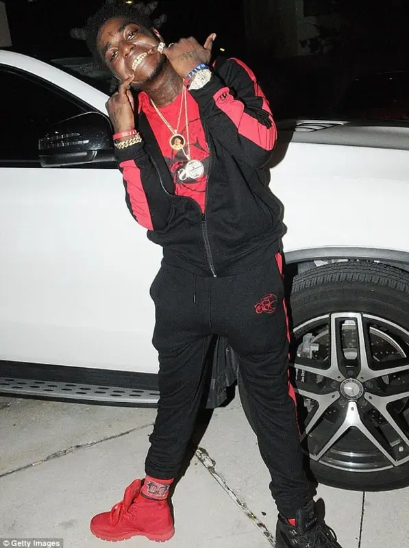 Kodak Black outfit in Sniper Gang Apparel and Timberland, 2017