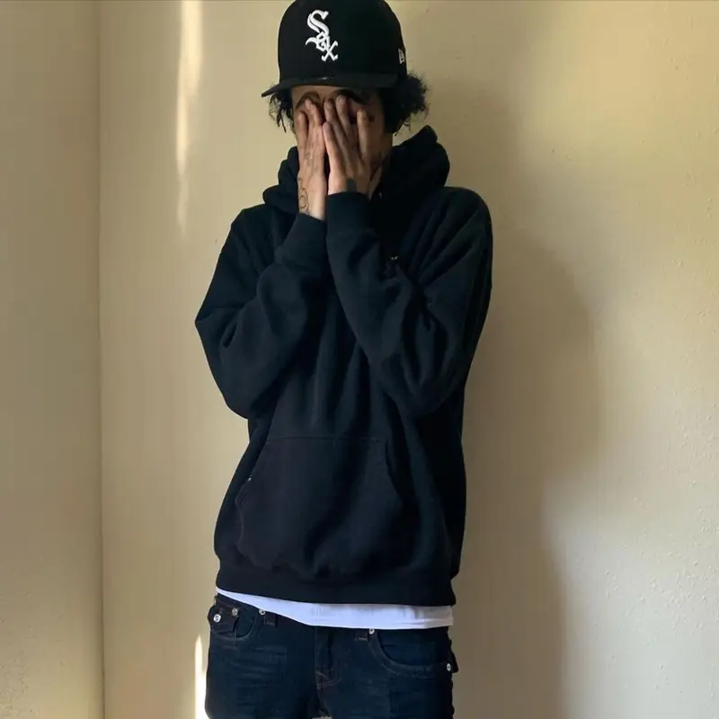 Wifisfuneral outfit in Rihanna Merch, True Religion, and New Era, 2021