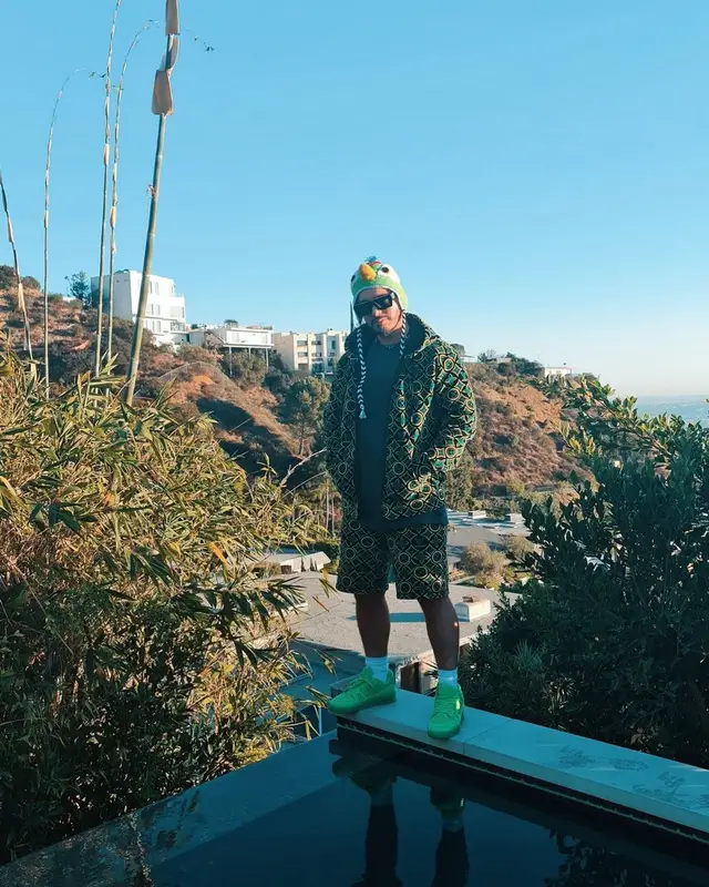 J Balvin outfit in Louis Vuitton and 99%IS, 2021