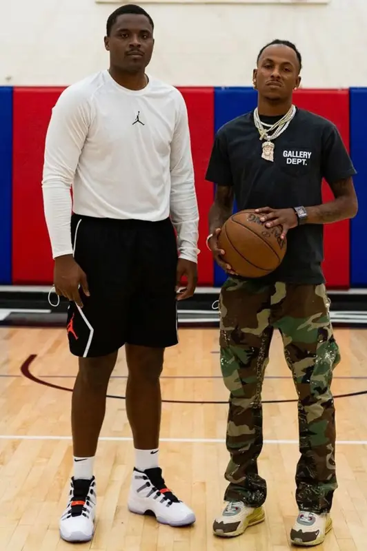Rich The Kid outfit in Gallery Dept., Nike, and Spalding, 2021