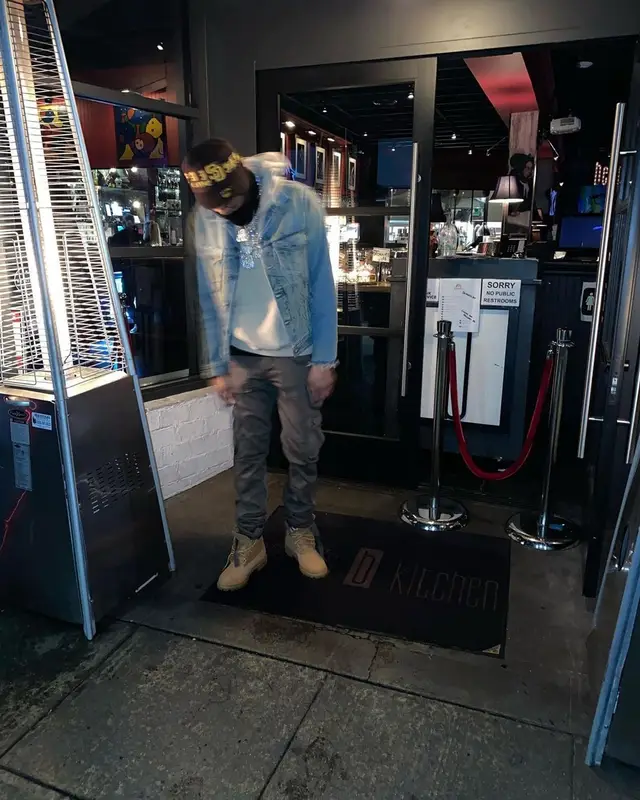 G Herbo outfit in Off-White, Amiri, and Timberland, 2021