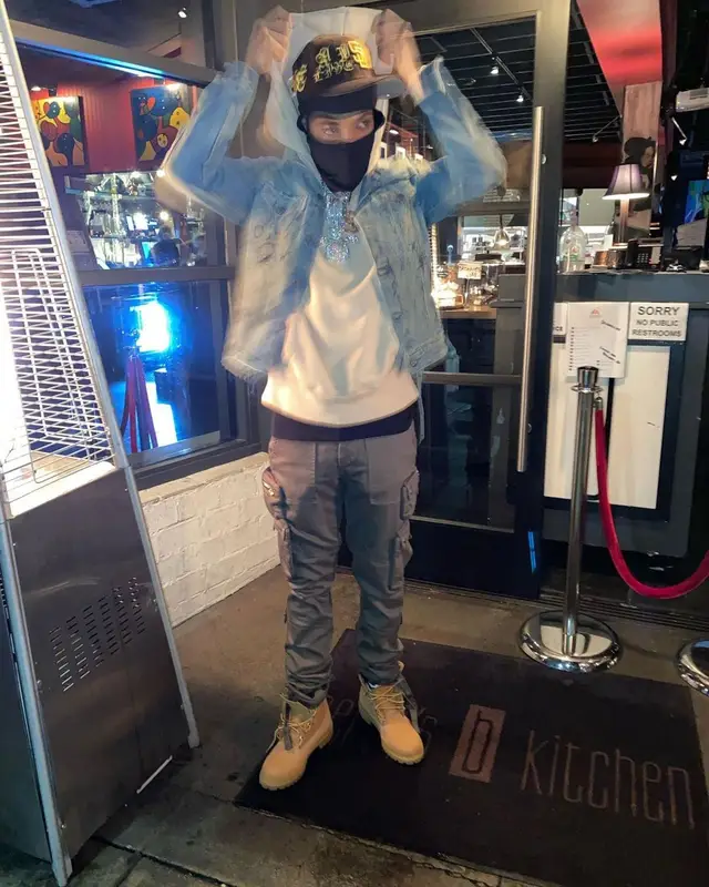 G Herbo outfit in Off-White, Amiri, and Timberland, 2021