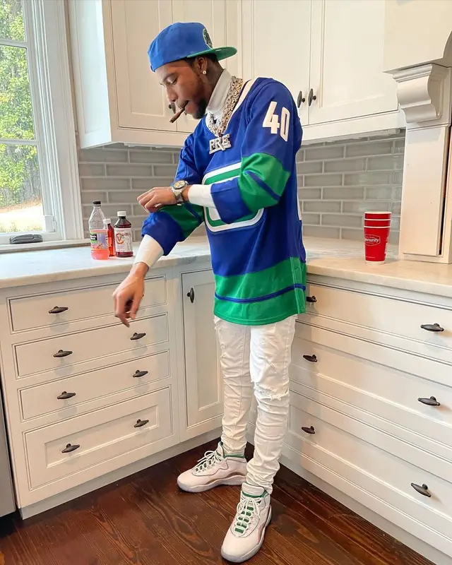 Key Glock outfit in Amiri, Jordan, and Mitchell & Ness, 2021
