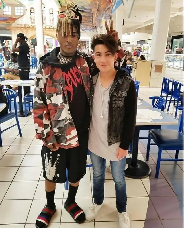 XXXTentacion outfit in REVENGE, Louis Vuitton, and Clouted Up, 2017