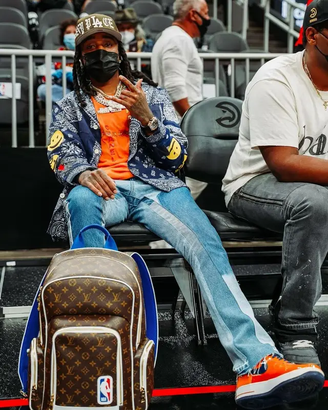 Quavo outfit in Readymade, Chanel, and Pharrell Williams, 2021
