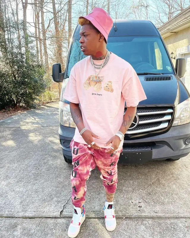 Yung Bleu outfit in Palm Angels, Kanye West Merch, and Prada, 2021