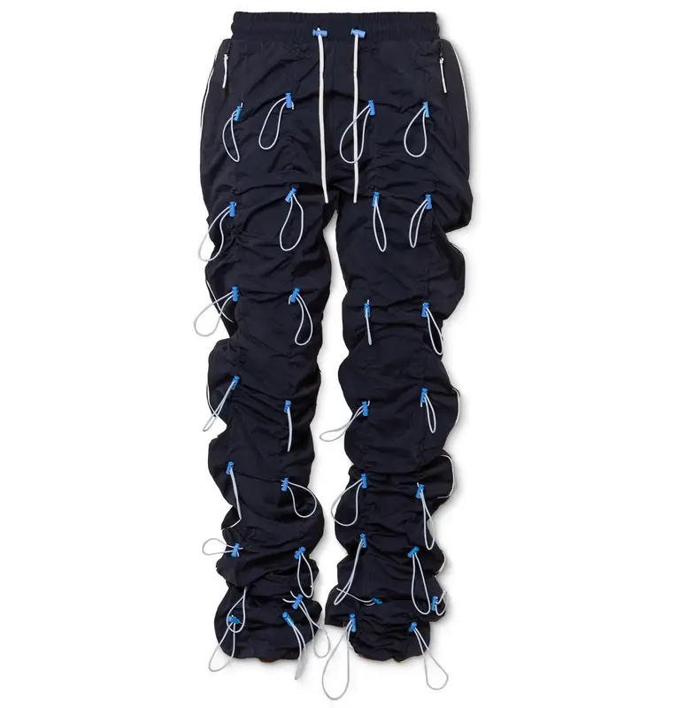 99%IS Gobchang Tapered Stretch-shell Drawstring Trousers In Blue $1010