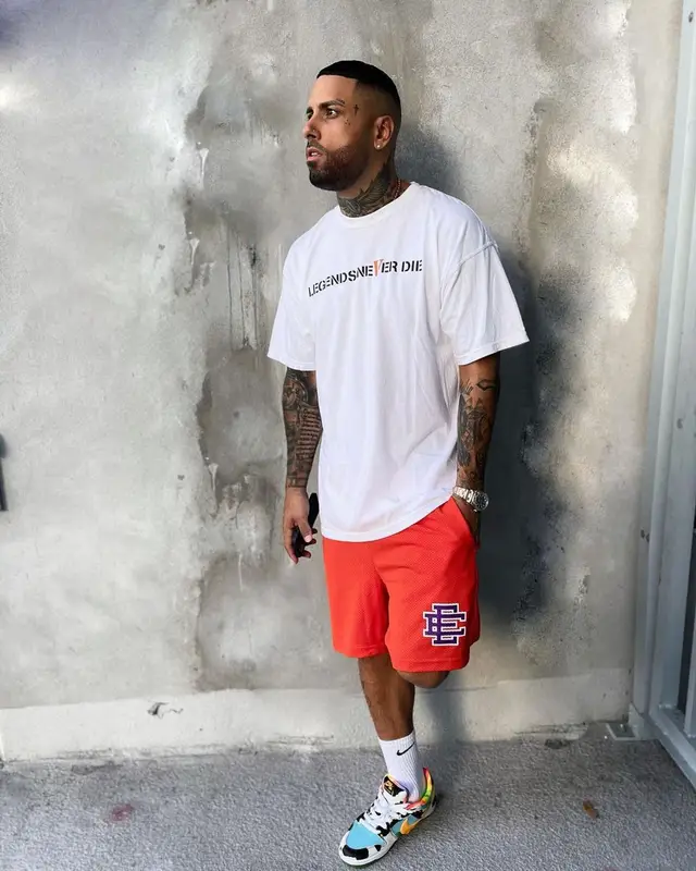 Nicky Jam outfit in Vlone, Eric Emanuel, and Juice Wrld Merch, 2021