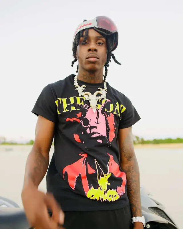 Polo G outfit in Polo G Merch, Louis Vuitton, and Prada, 2020