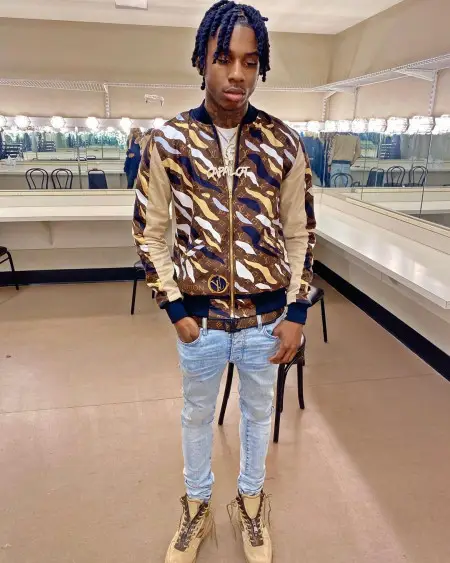 Polo G outfit in Amiri, Louis Vuitton, and Exclusive Game, 2020