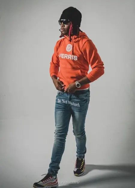 Lil Keed outfit in Chanel, Ethika, and Nike, 2020
