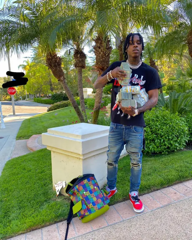 Polo G outfit in Amiri, Gucci, and Jordan, 2020