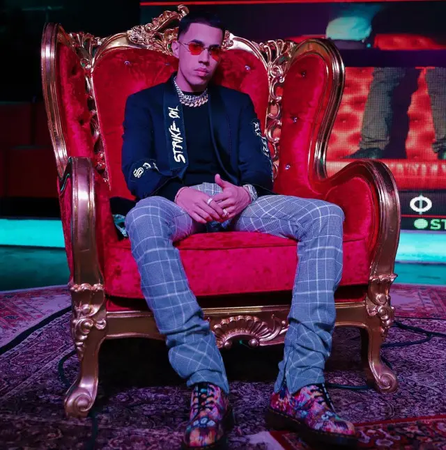 Brytiago outfit in Strike Oil, Dr. Martens, and Cleo Nicci, 2020