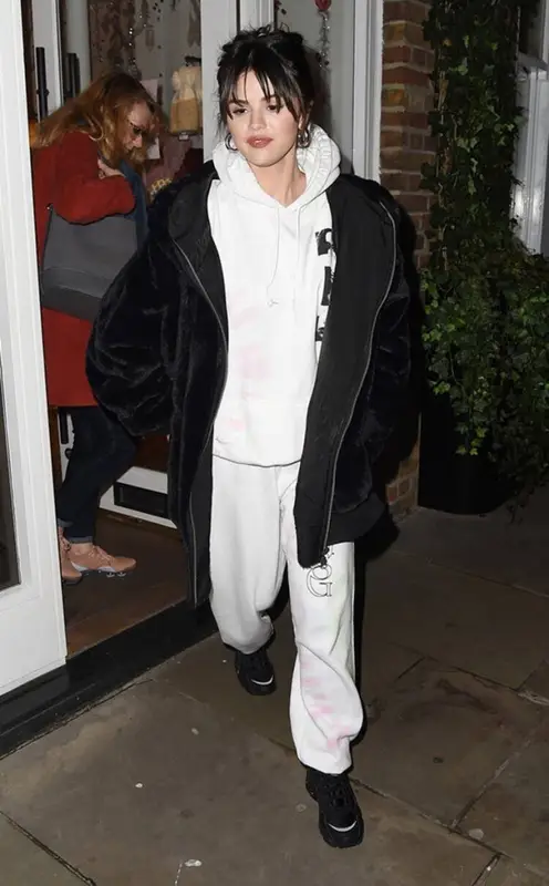 Selena Gomez outfit in Free People, Puma, and Selena Gomez Merch, 2020