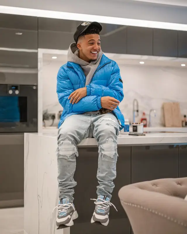 Jadon Sancho outfit in Dior, Louis Vuitton, and Amiri, 2020