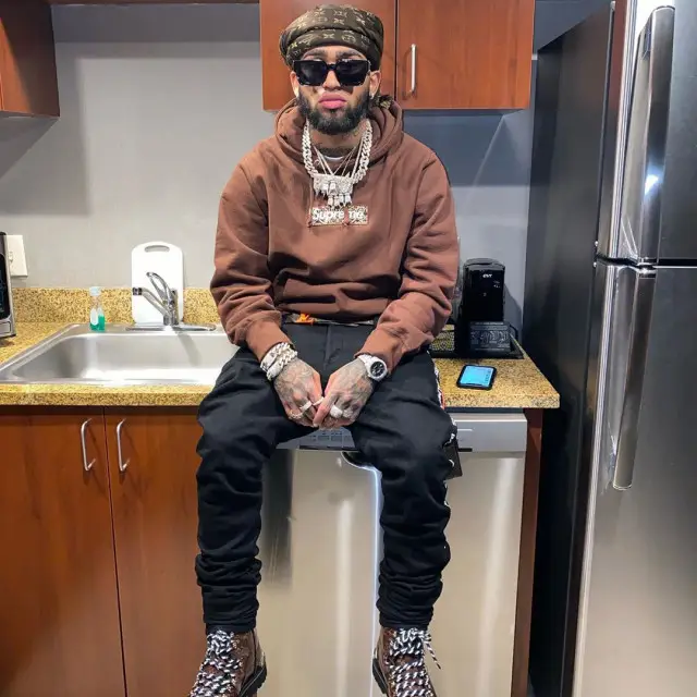 Bryant Mayers outfit in Supreme, Balmain, and Louis Vuitton, 2020