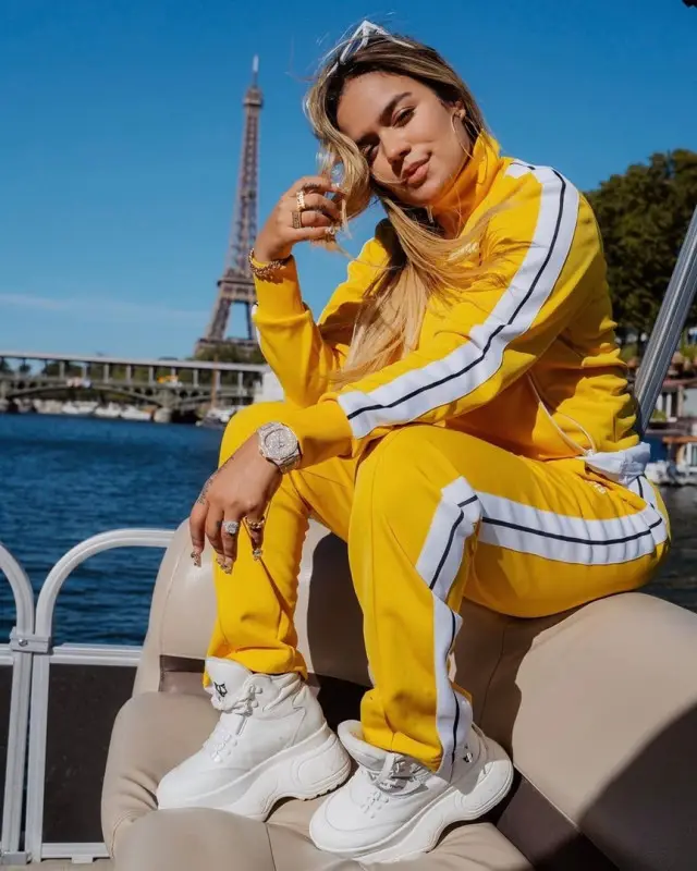 Karol G outfit in Palm Angels, Naked Wolfe, and Louis Vuitton, 2020