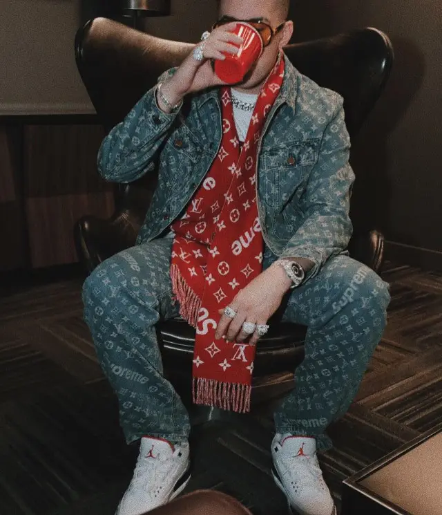 Bad Bunny outfit in Gucci, Supreme, and Louis Vuitton, 2020