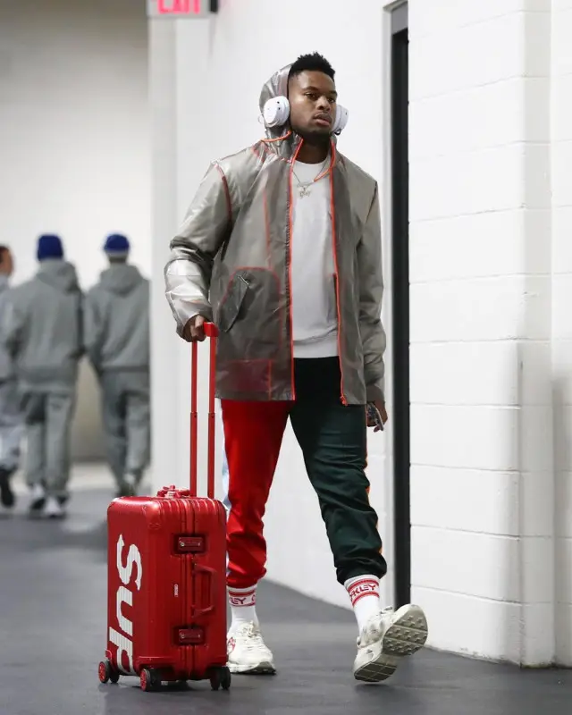 JuJu outfit in Asos Design, Supreme, and Rimowa, 2020
