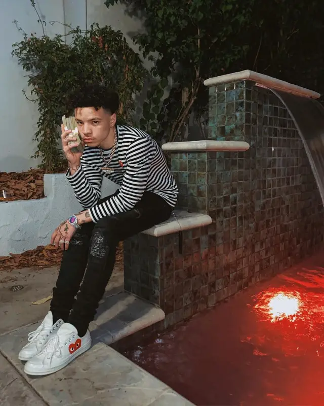 Lil Mosey outfit in Comme Des Garcons, Amiri, and Converse, 2020