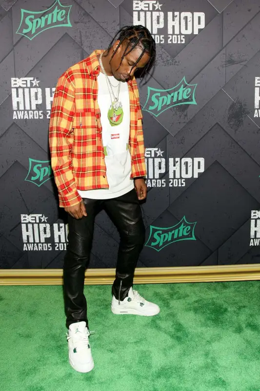Travis Scott outfit in Gosha Rubchinskiy, Supreme, and Balmain, 2020