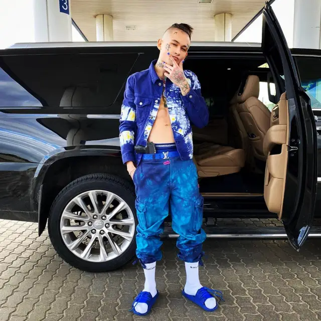Morgenshtern outfit in Palm Angels, Louis Vuitton, and Dolce & Gabbana, 2020