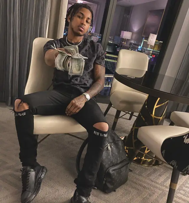 DDG outfit in Louis Vuitton, Rta, and Alexander McQueen, 2020