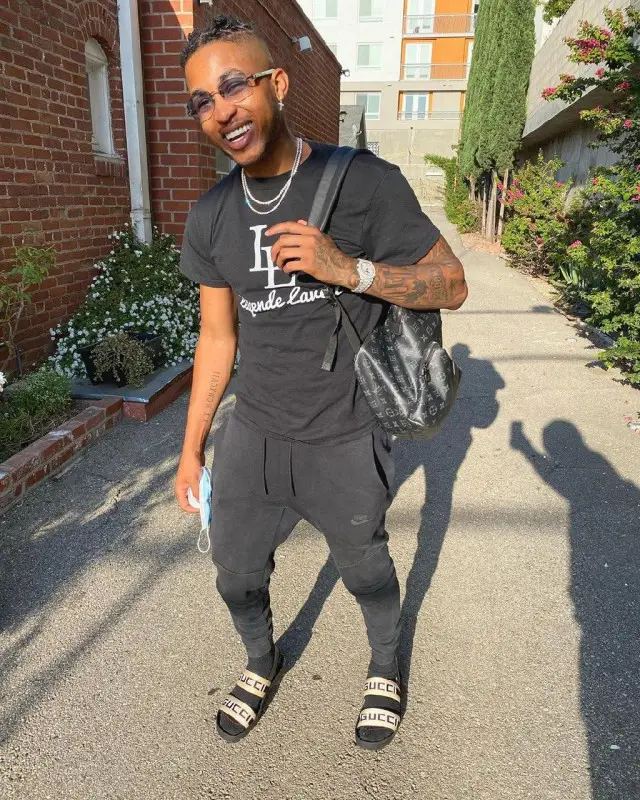 DDG outfit in Legende Lavell, Louis Vuitton, and Cartier, 2020