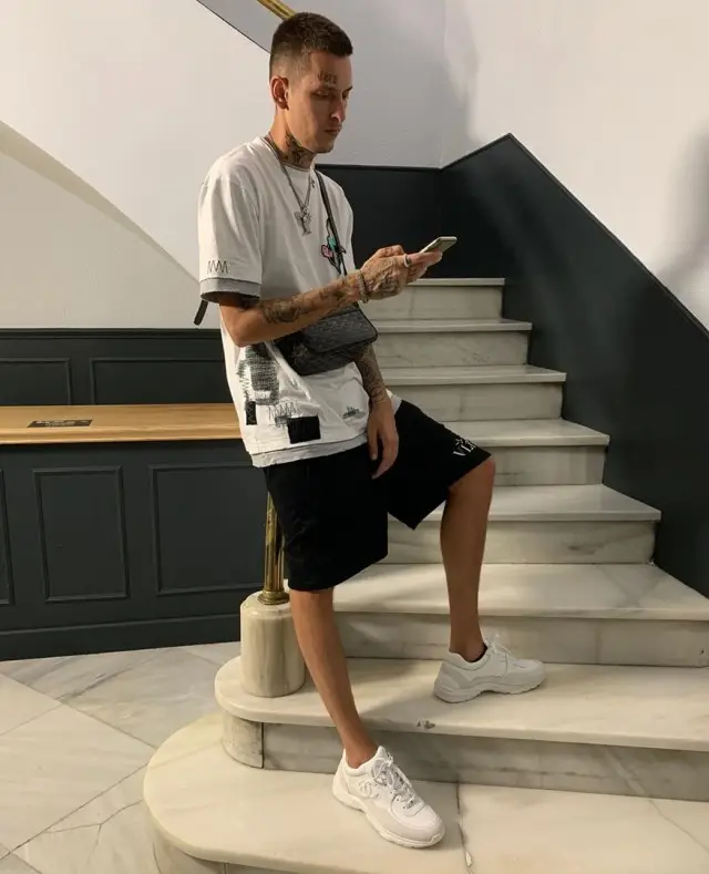 Kizaru outfit in Palm Angels, Valentino, and Goyard, 2020