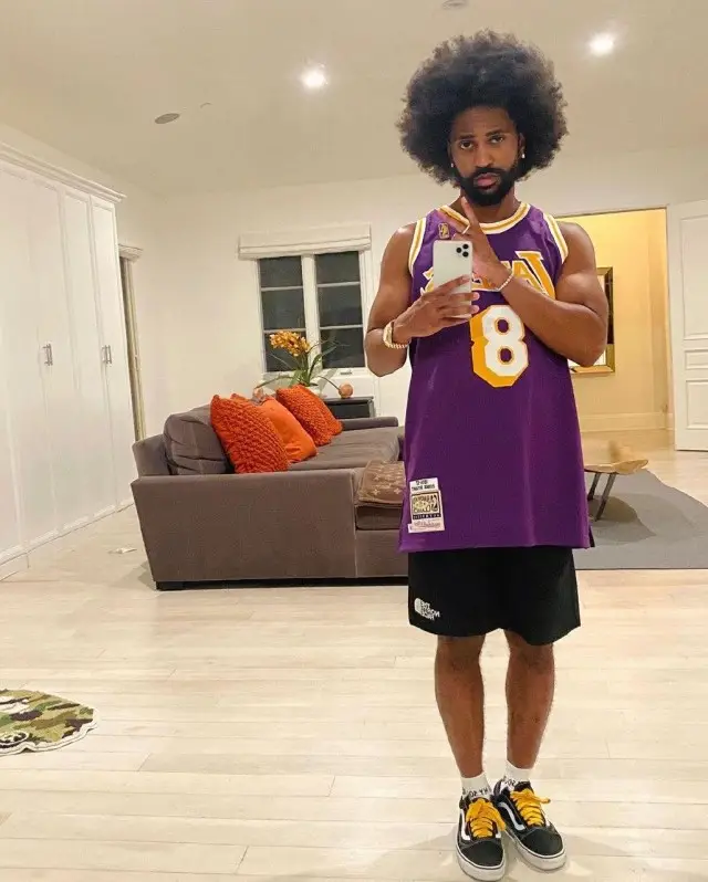 Big Sean outfit in Mitchell & Ness, The North Face, and Vans, 2020