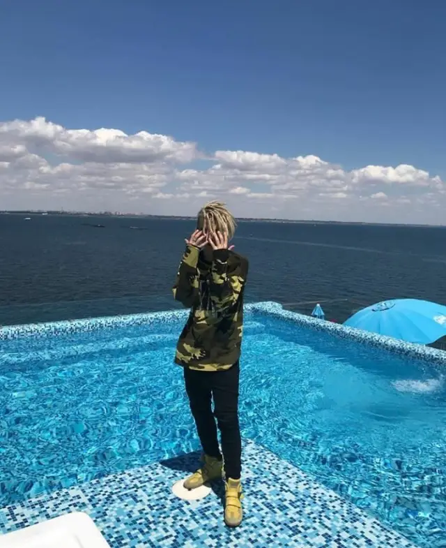 Lil Morty outfit in Shyne and Maison Margiela, 2018