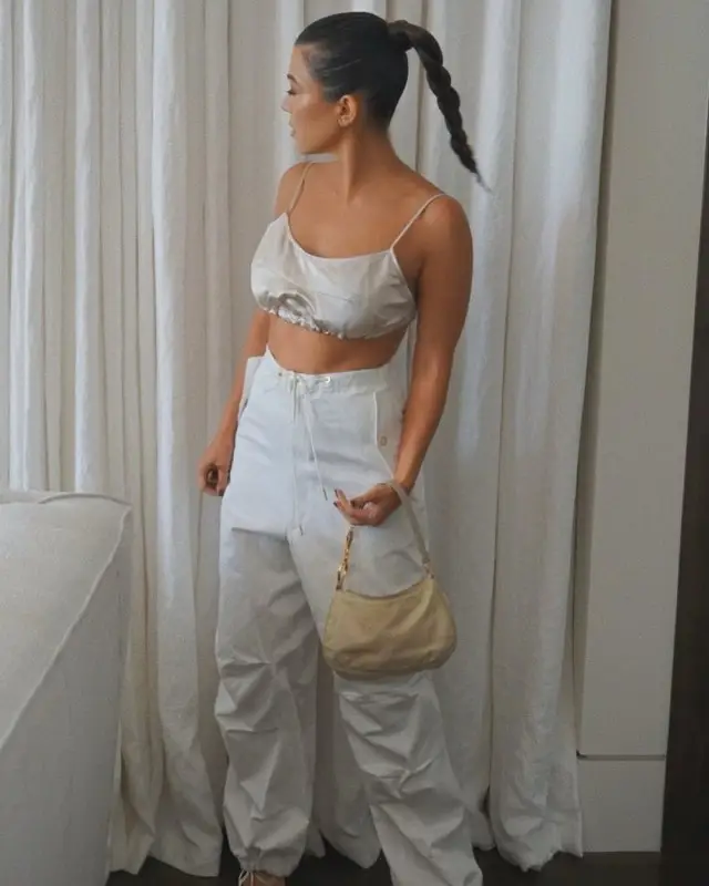 Kourtney Kardashian outfit in Ruèce, Dion Lee, and Prada, 2020