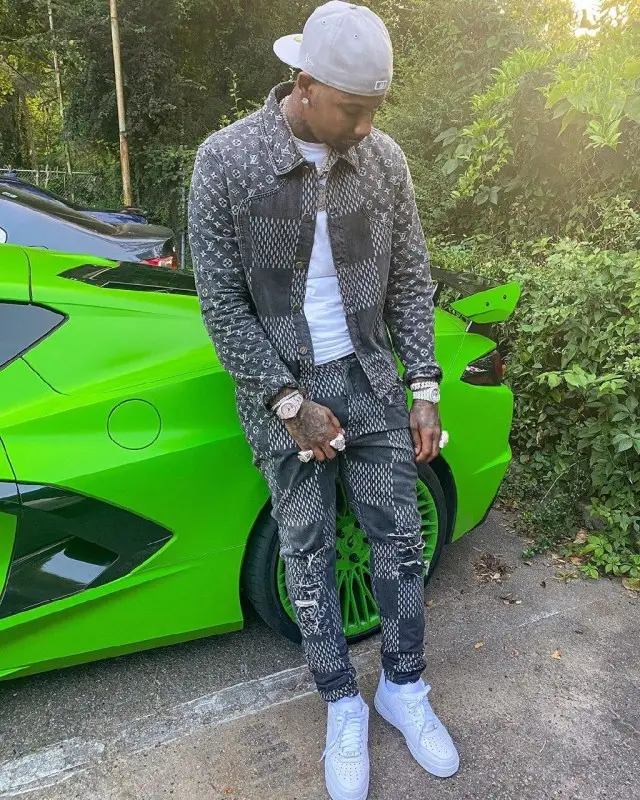 Moneybagg Yo outfit in Louis Vuitton, New Era, and Nigo, 2020