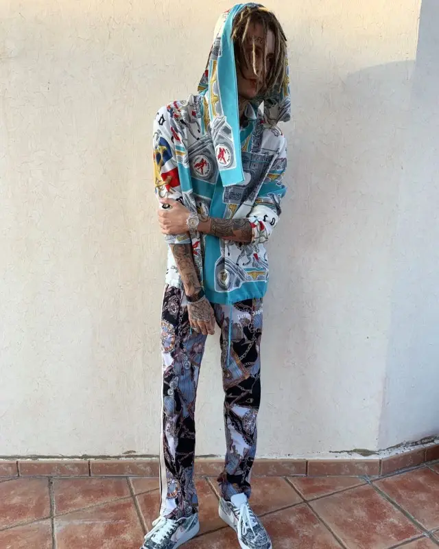 Kizaru outfit in Louis Vuitton, Palm Angels, and Nike, 2019
